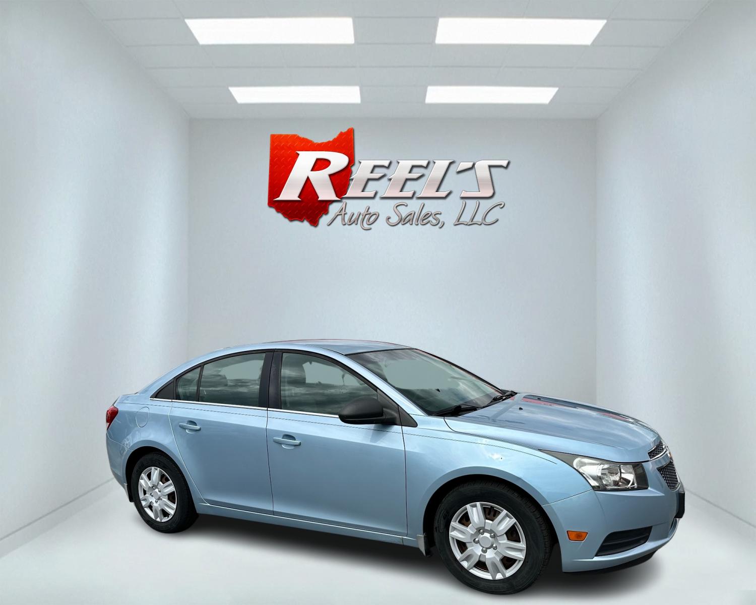2011 Blue /Black Chevrolet Cruze LS Auto (1G1PC5SHXB7) with an 1.8L I4 DOHC 16V engine, 6-Speed Automatic transmission, located at 547 E. Main St., Orwell, OH, 44076, (440) 437-5893, 41.535435, -80.847855 - Photo #3